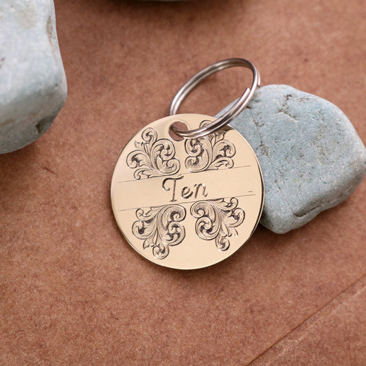 Brass Scrollwork Dog tag.