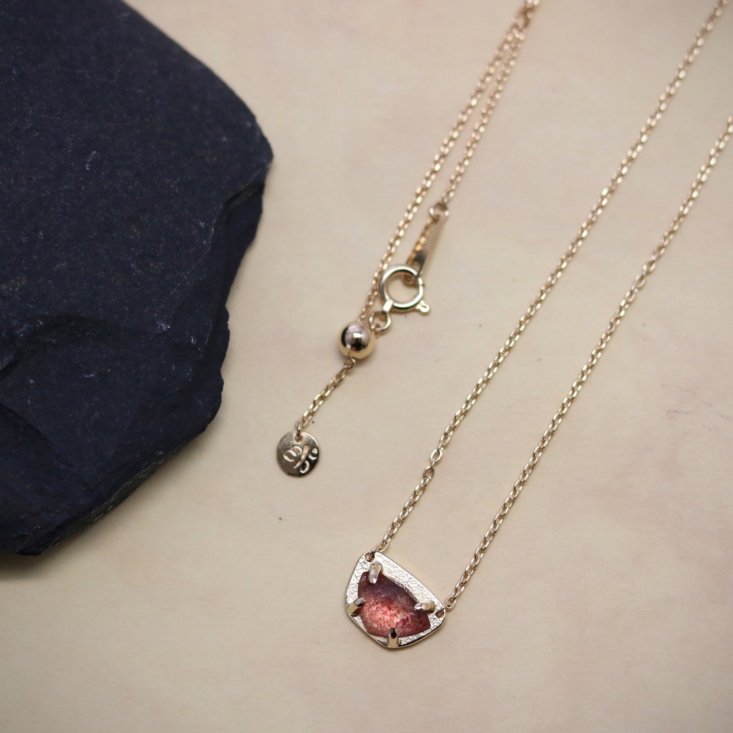 K18 Strawberry Quartz Emblem Pendant.