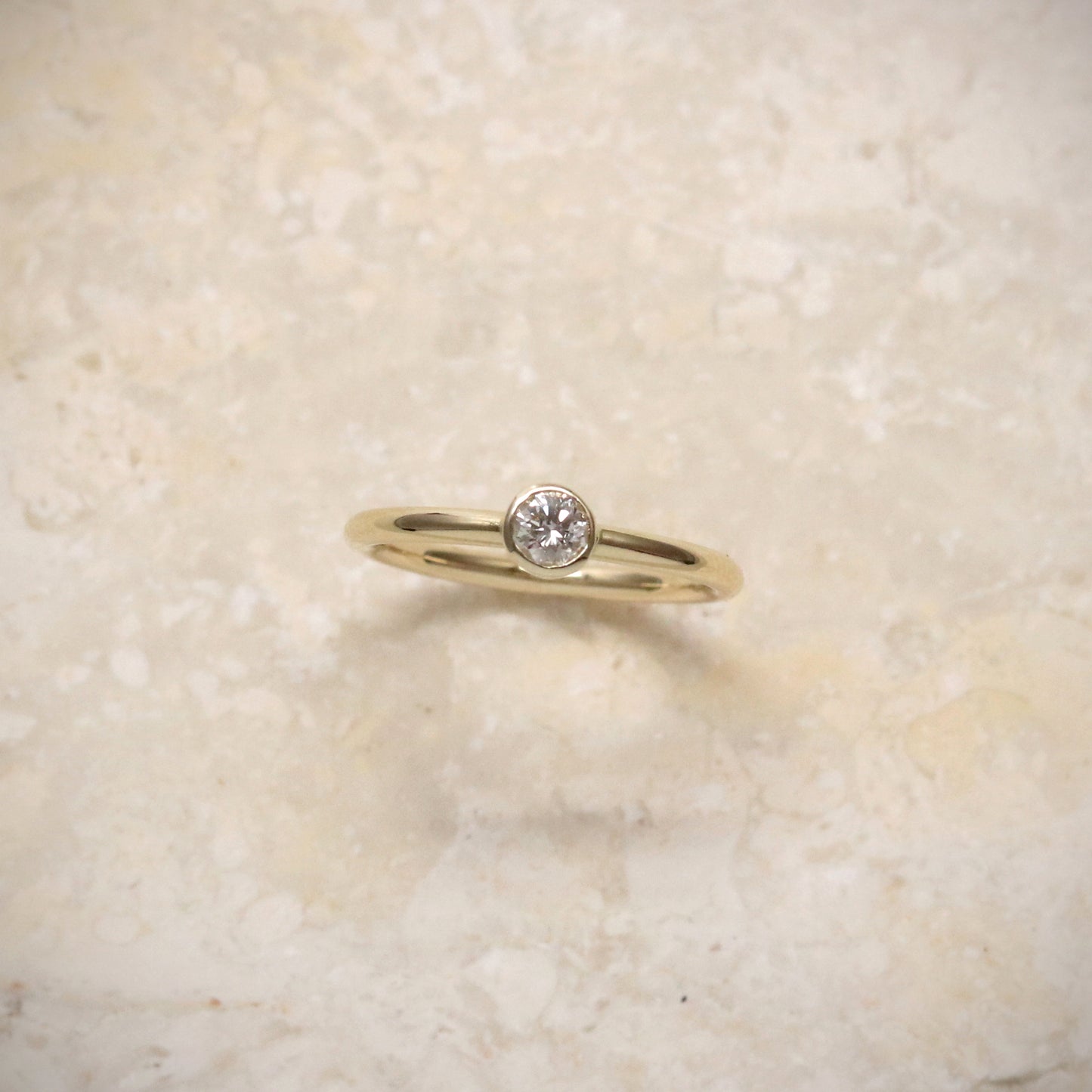 K18 0.108ct Diamond Ring