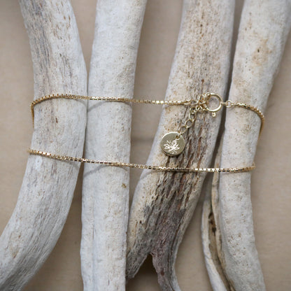 K18. Lotus Charm Anklet.